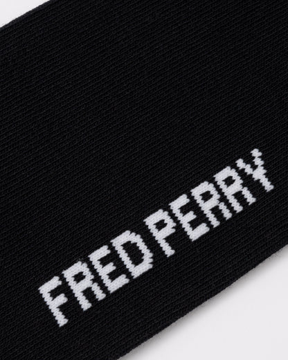 Logo on the Fred Perry Mens Tipped Sports Sock - Black/Snow White 843