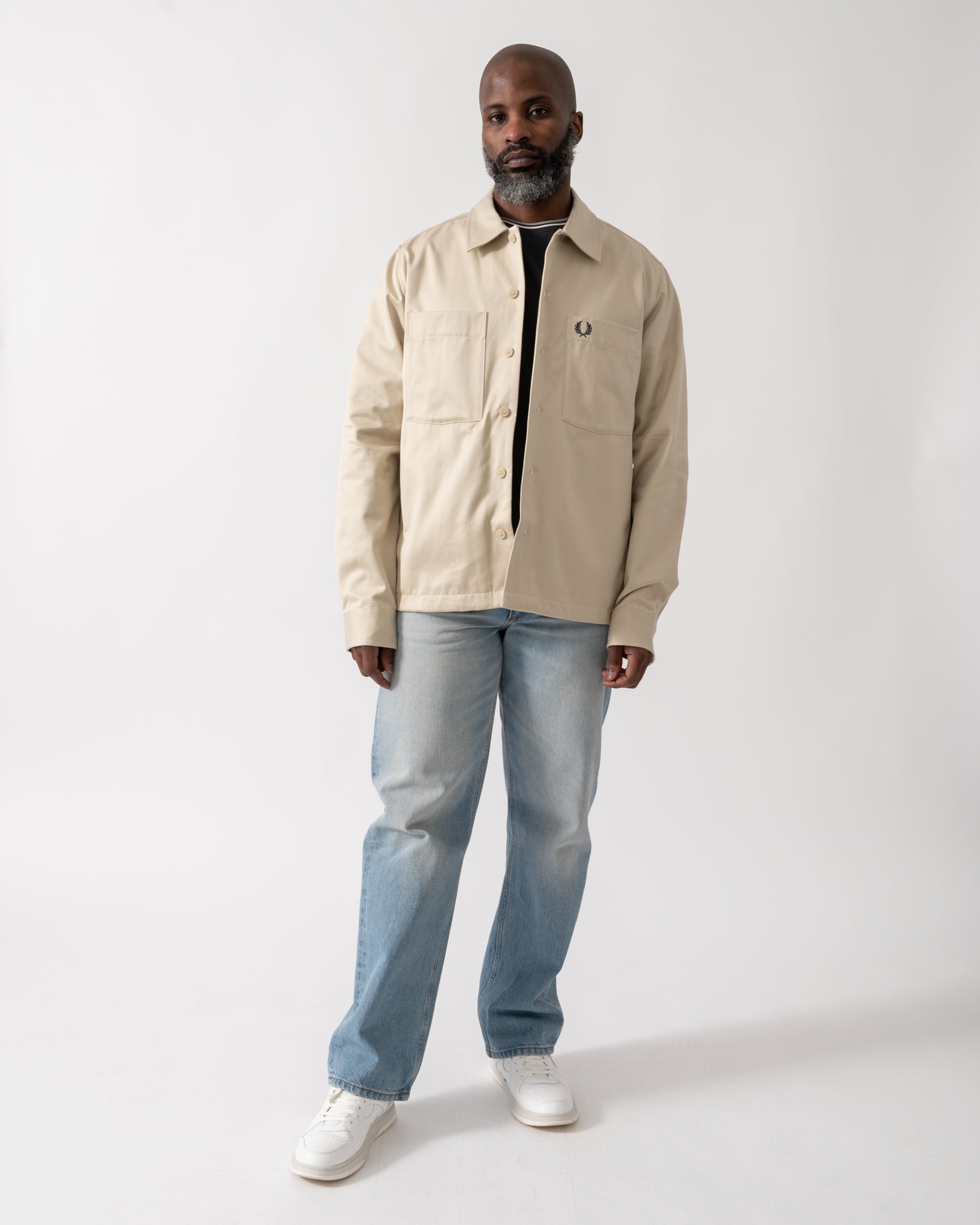 Full length shot of a Model wearing a Fred Perry Mens Twill Overshirt in Oatmeal