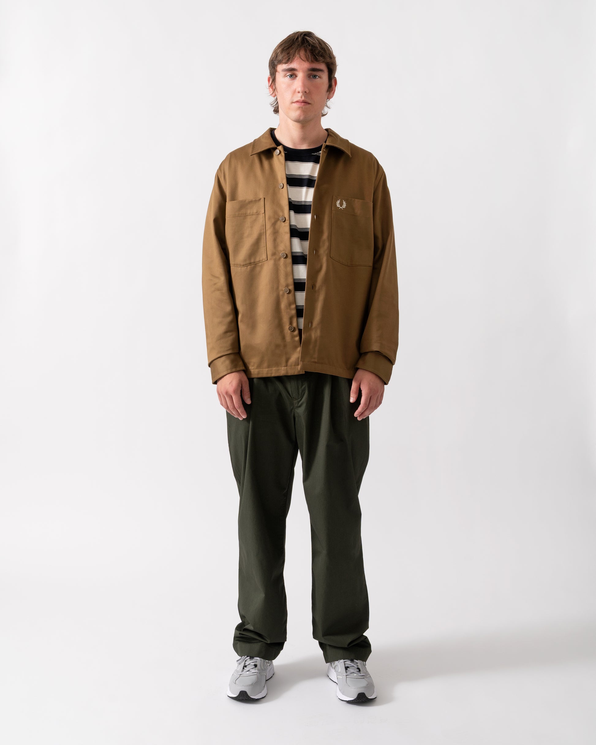 full length of a model wearing a Fred Perry Mens Twill Overshirt in Shaded Stone P96