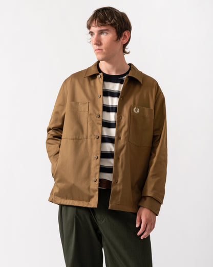 model wearing a Fred Perry Mens Twill Overshirt in Shaded Stone P96