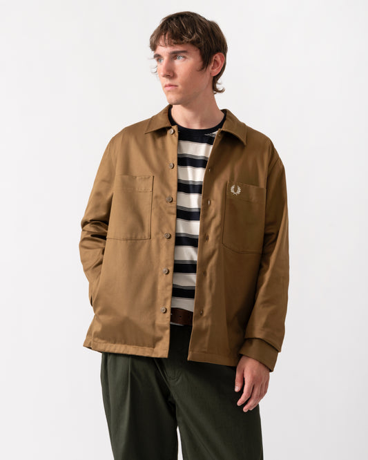 model wearing a Fred Perry Mens Twill Overshirt in Shaded Stone P96