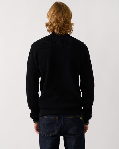 back of a model wearing a Fred Perry Mens Waffle Stitch Half Zip Jumper in Black 198