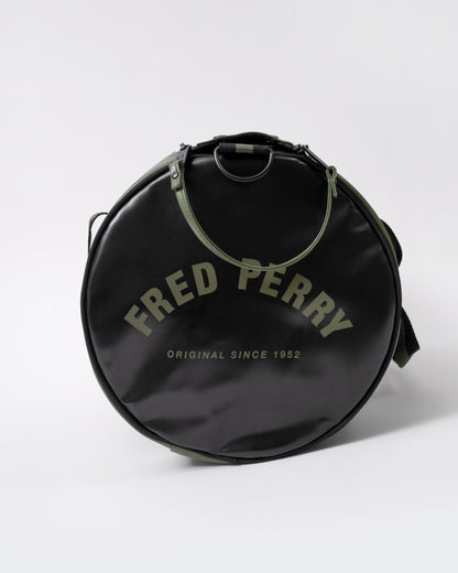 end view of a Fred Perry Recycled Polyester Classic Barrel Bag in Laurel Wreath Green and Black Z50