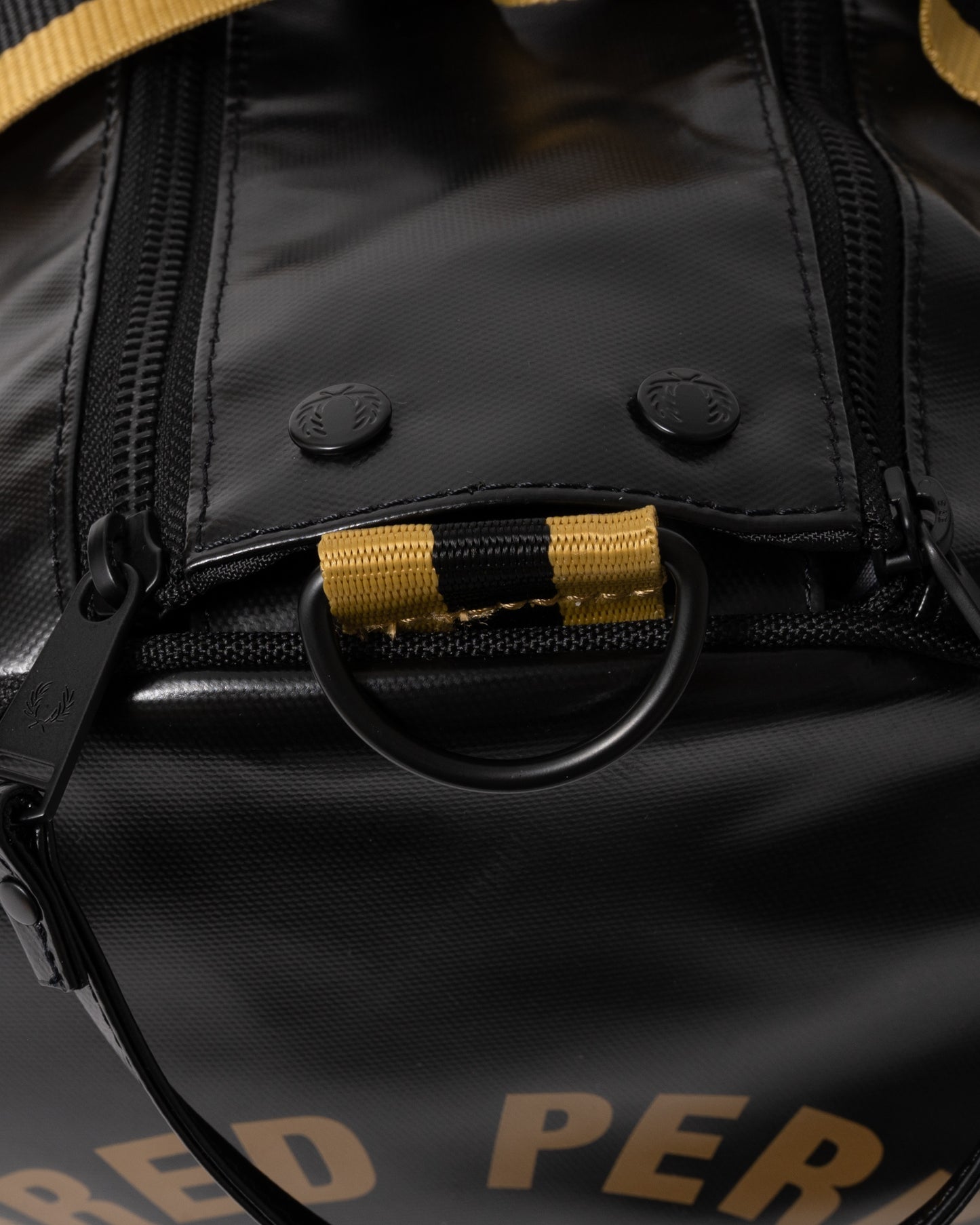 Zipper detail of Fred Perry Tipped Classic Barrel Bag - Black/Gold 774
