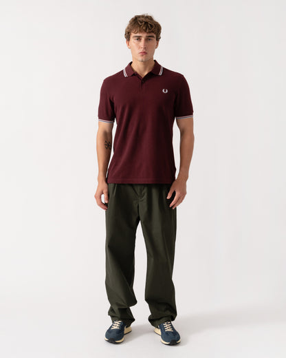 Outfit shot of Fred Perry Mens Twin Tipped Signature Polo Shirt - Oxblood/Iced Pink/Dusk Blue 83C