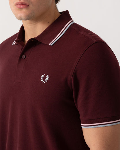 Close up of Fred Perry Mens Twin Tipped Signature Polo Shirt - Oxblood/Iced Pink/Dusk Blue 83C
