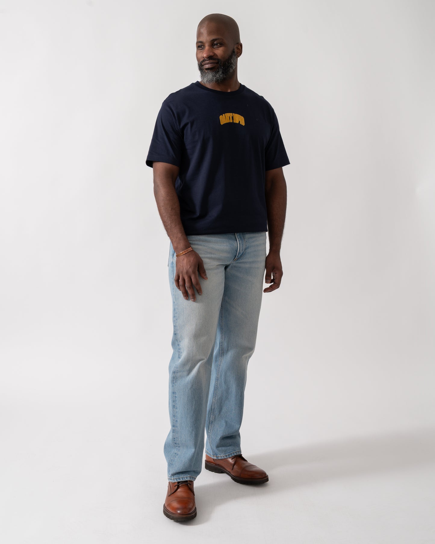 Full length shot of a Model wearing a GANT Mens 1949 Graphic Short Sleeve T-Shirt in Evening Blue