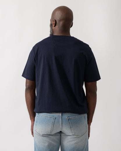 Back shot of a Model wearing a GANT Mens 1949 Graphic Short Sleeve T-Shirt in Evening Blue