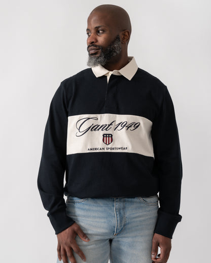 model wearing a GANT Mens Blocked Heavy Rugger in Black