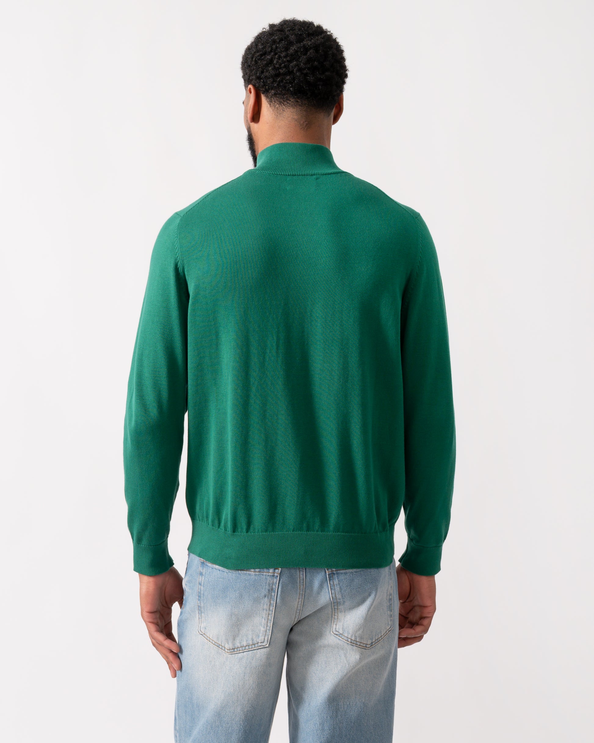 back shot of a model wearing a GANT Mens Classic Cotton Half Zip Jumper in Deep Forest Green