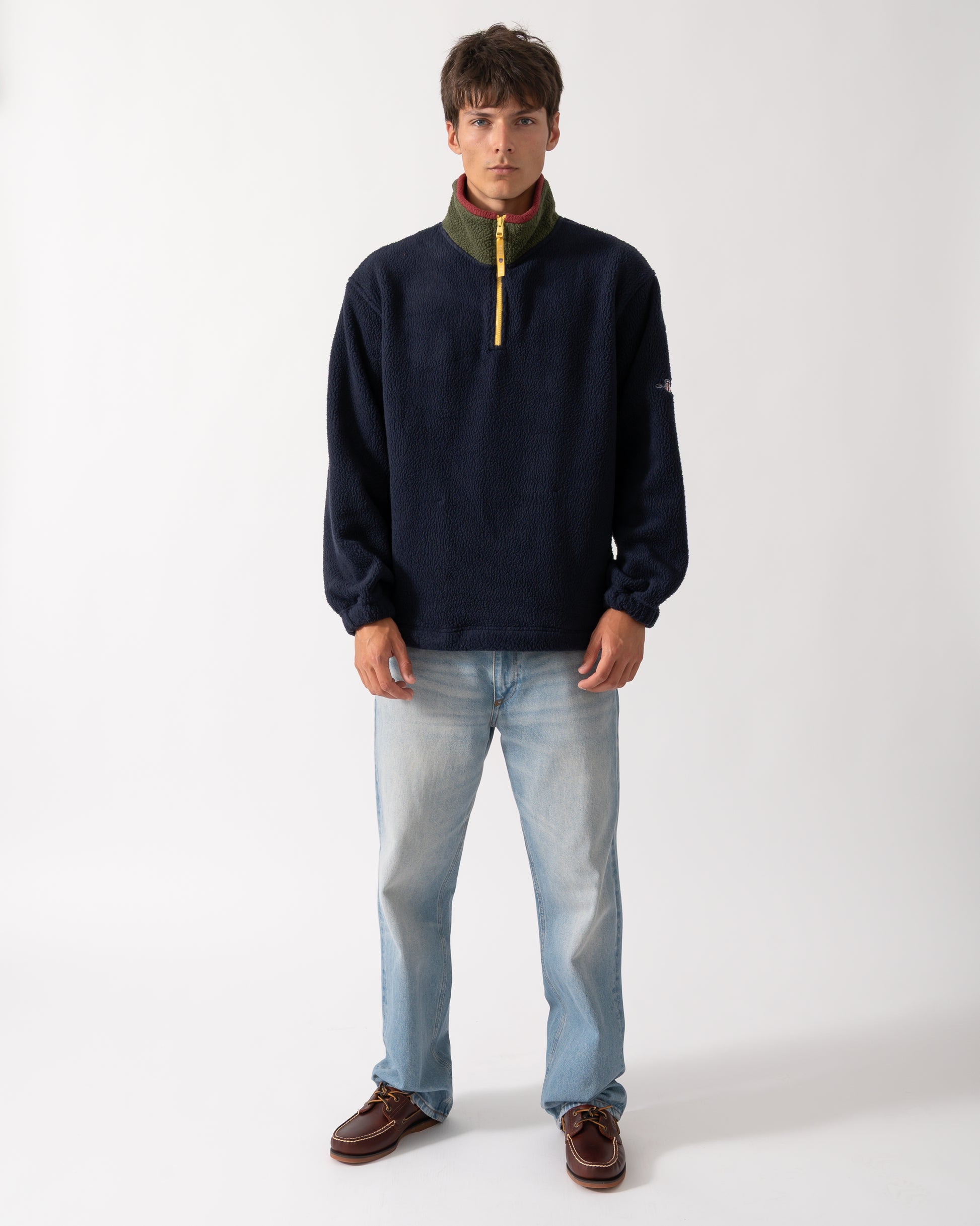 full length of a model wearing GANT Mens Color-Block Fleece in 433 Evening Blue