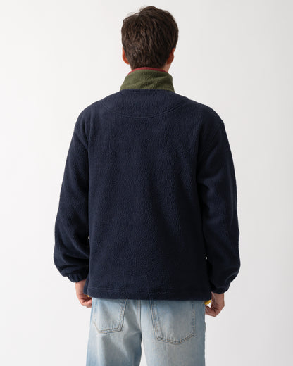 back of a model wearing GANT Mens Color-Block Fleece in 433 Evening Blue