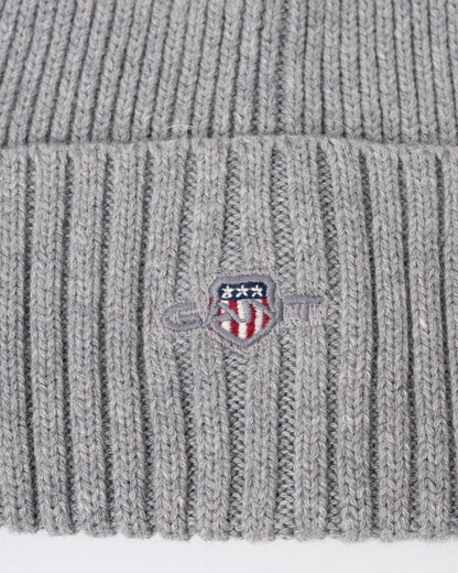 logo detail of a GANT Mens Cotton Blend Logo Beanie in 93 Grey Melange