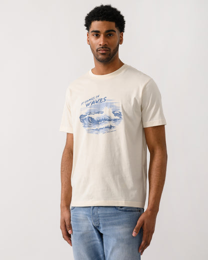 model wearing a GANT Mens Graphic Short Sleeve T-Shirt in 130 Cream