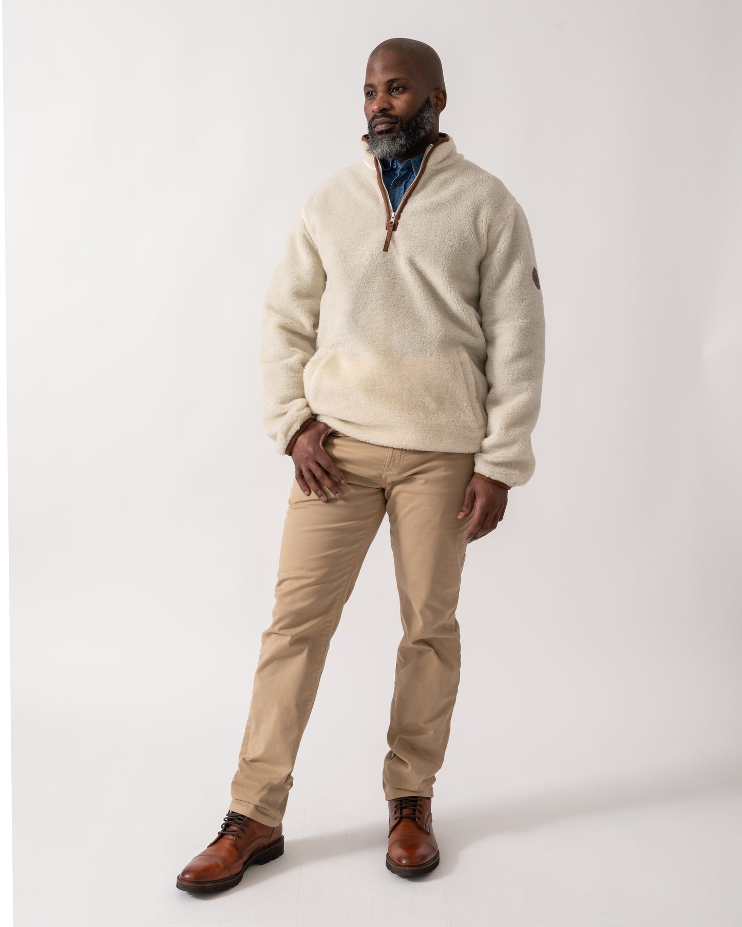 full length shot of a model wearing a GANT Mens Half Zip Fleece in Cream