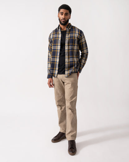 full length of a model wearing a GANT Mens Long Sleeve Windblown Flannel Large Check Shirt in Evening Blue