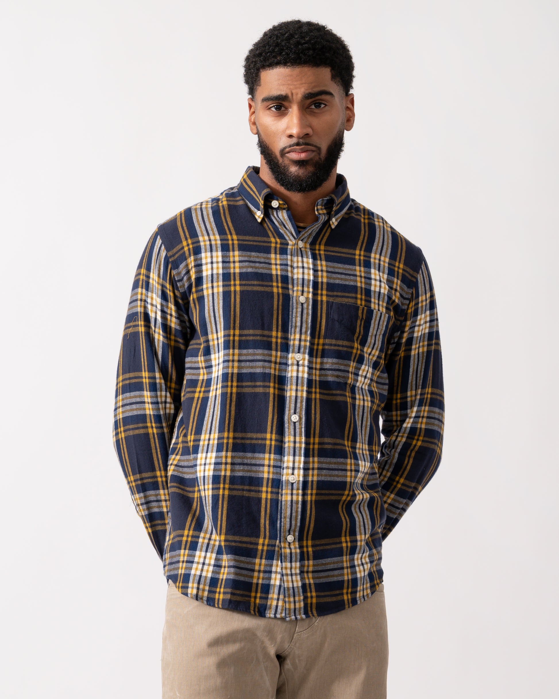 model wearing a GANT Mens Long Sleeve Windblown Flannel Large Check Shirt in Evening Blue