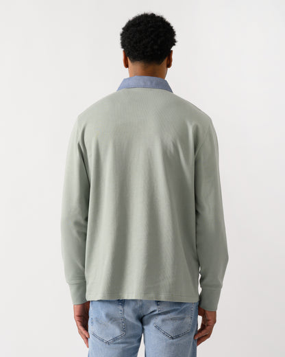 back view of a model wearing a GANT Mens Regular Chambray Heavy Rugger in 10 Ceramic Grey