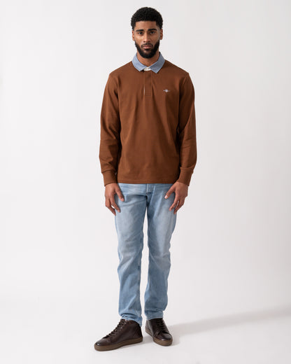 full length of a Model wearing s GANT Mens Regular Fit Chambray Heavy Rugger in Mahogany Brown