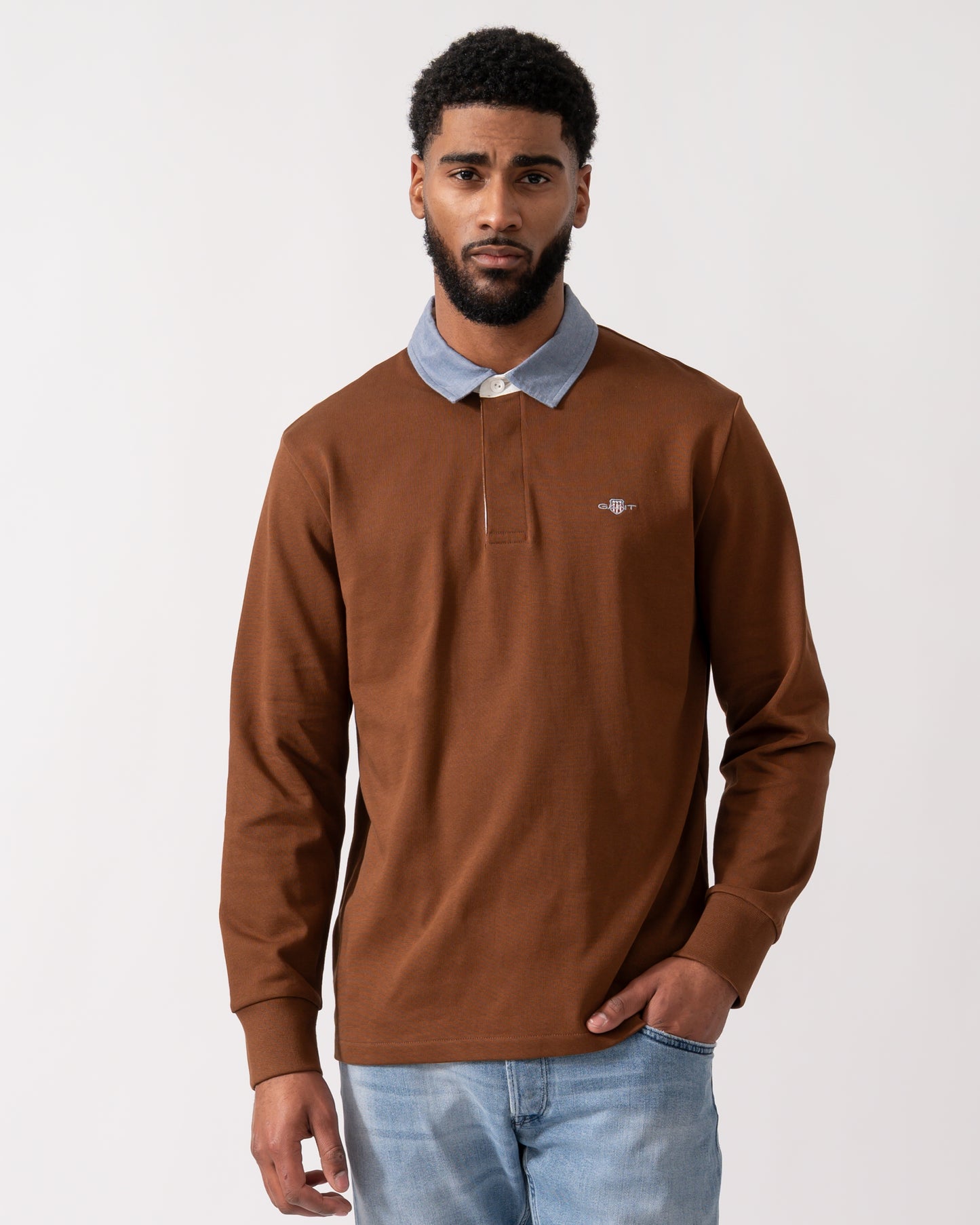 Model wearing s GANT Mens Regular Fit Chambray Heavy Rugger in Mahogany Brown
