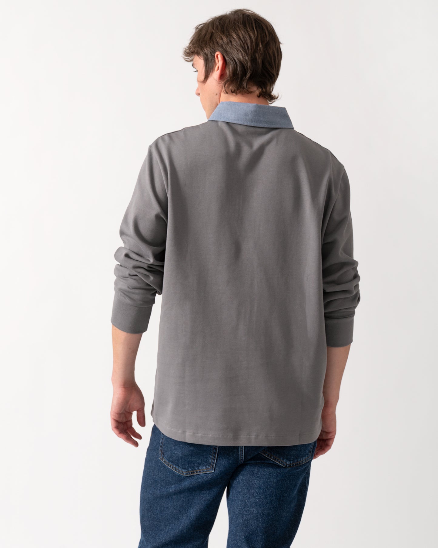 back shot of a model wearing a GANT Mens Regular Fit Chambray Heavy Rugger in 38 Mid Grey