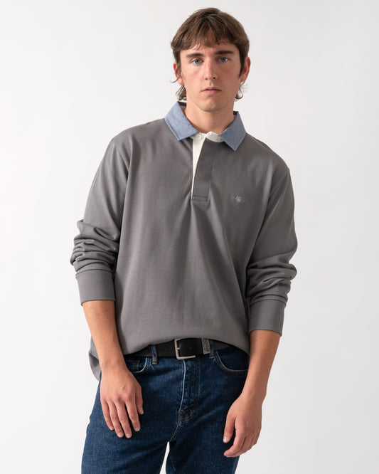 model wearing a GANT Mens Regular Fit Chambray Heavy Rugger in 38 Mid Grey