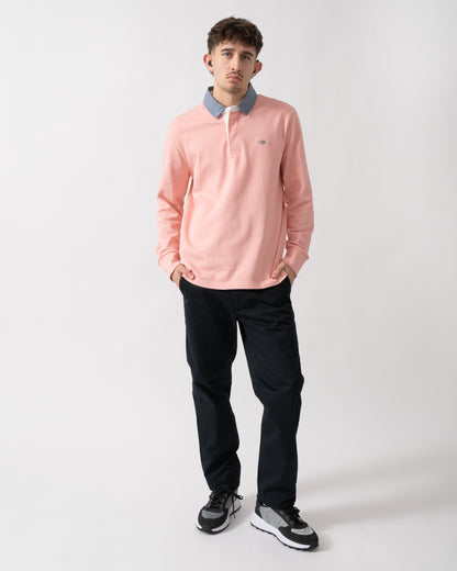 full length shot of a model wearing a GANT Mens Regular Fit Chambray Heavy Rugger in Bubblegum Pink