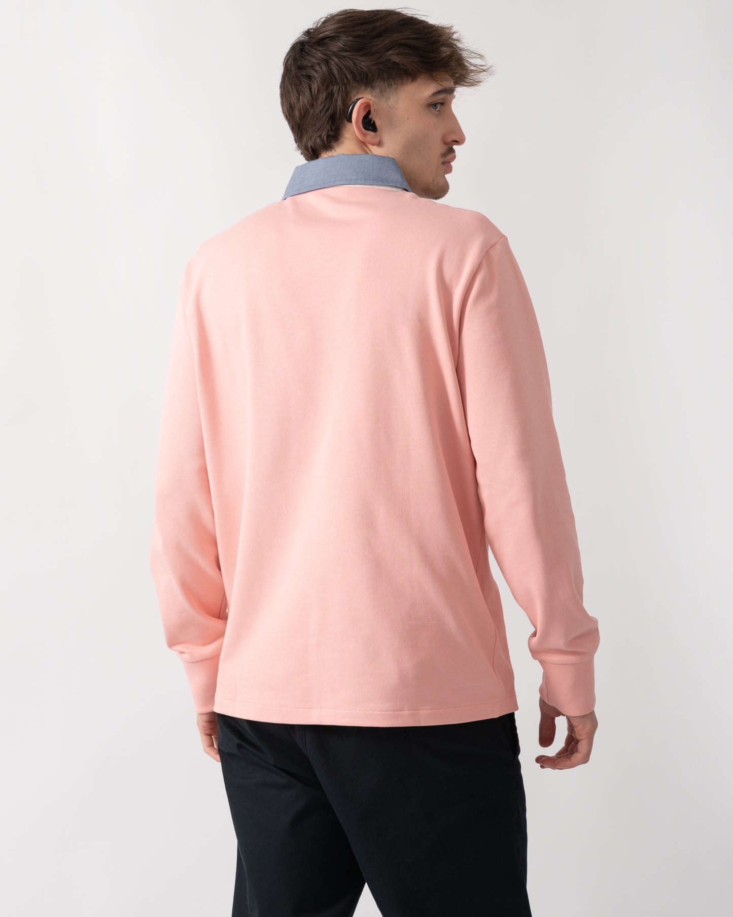 back shot of a model wearing a GANT Mens Regular Fit Chambray Heavy Rugger in Bubblegum Pink