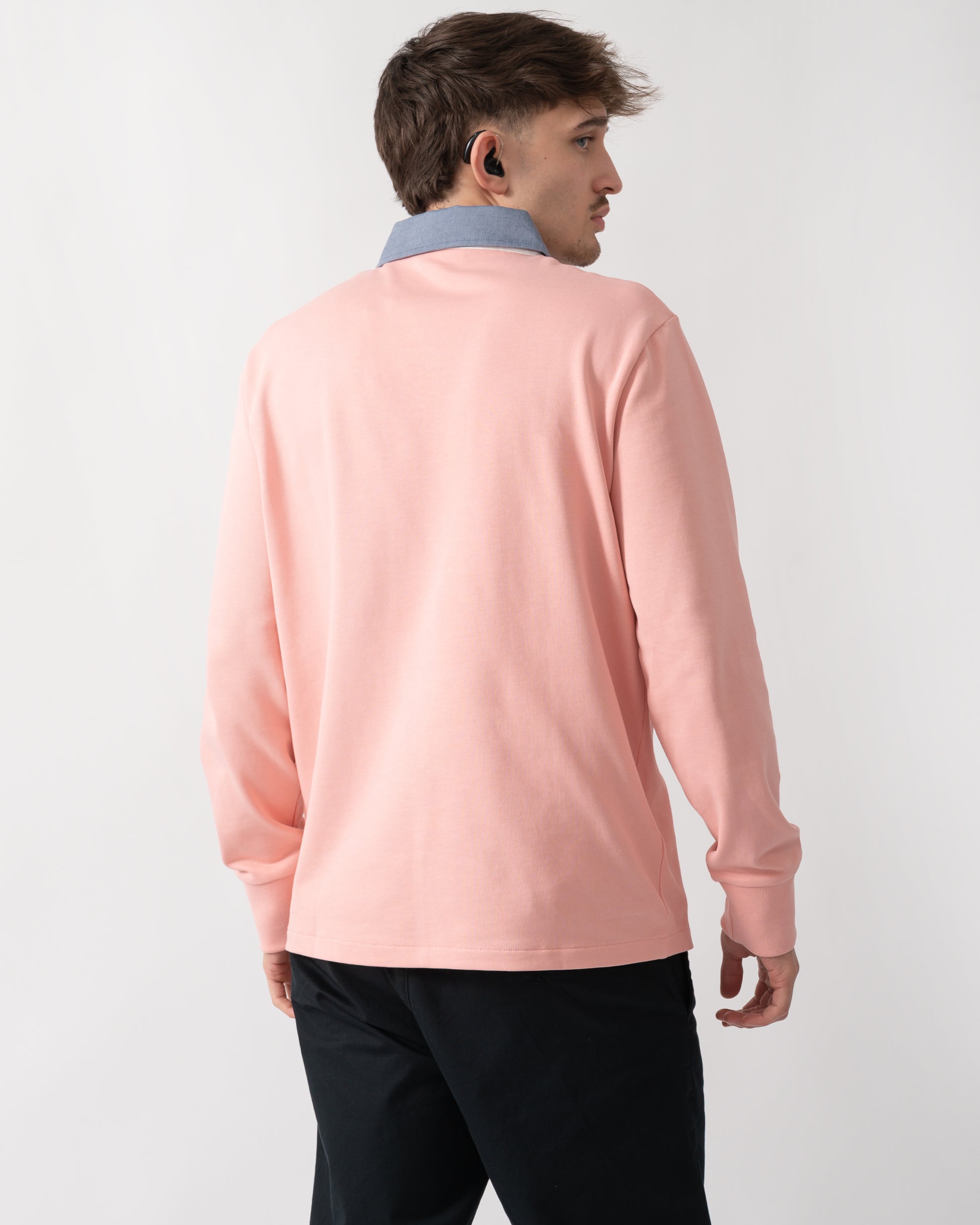 back shot of a model wearing a GANT Mens Regular Fit Chambray Heavy Rugger in Bubblegum Pink