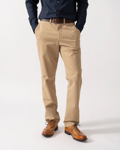 Model wearing GANT Mens Regular Fit Classic Chinos in Dark Khaki