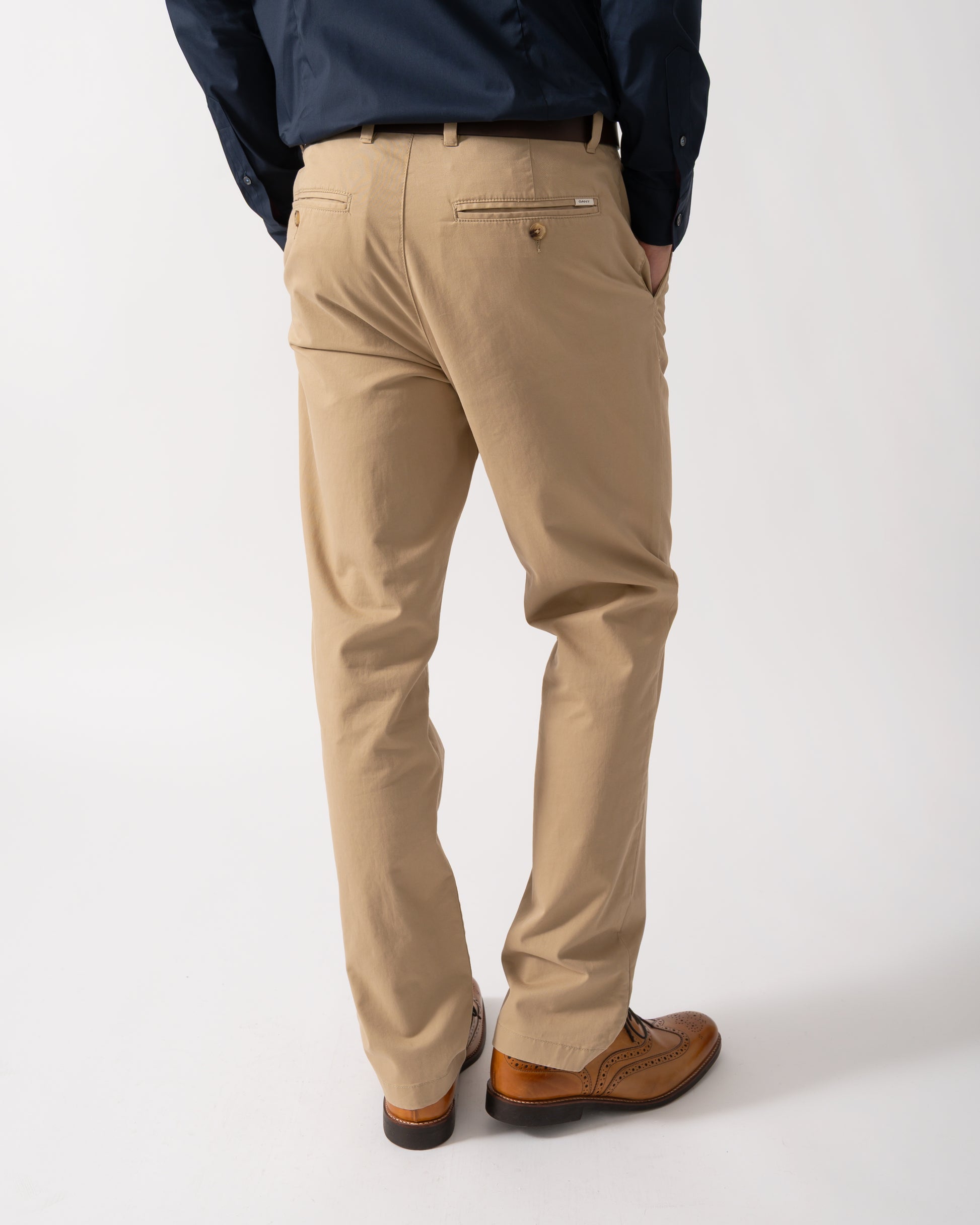 Back shot of a Model wearing GANT Mens Regular Fit Classic Chinos in Dark Khaki