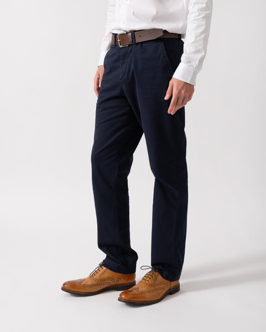 Model wearing GANT Mens Regular Fit Classic Chinos in Evening Blue
