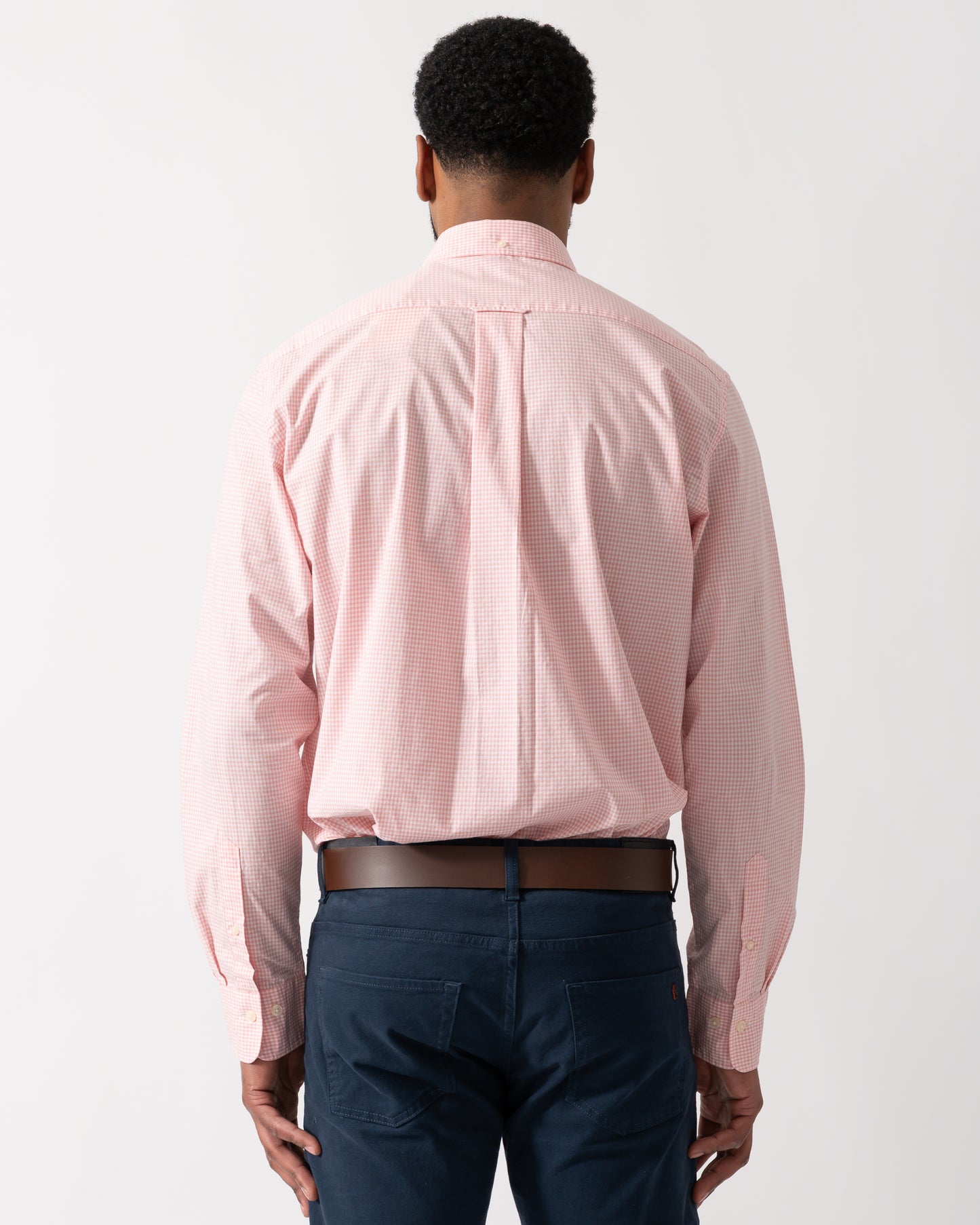 back shot of a Model wearing a GANT Mens Regular Fit Classic Poplin Gingham Shirt in Washed Pink