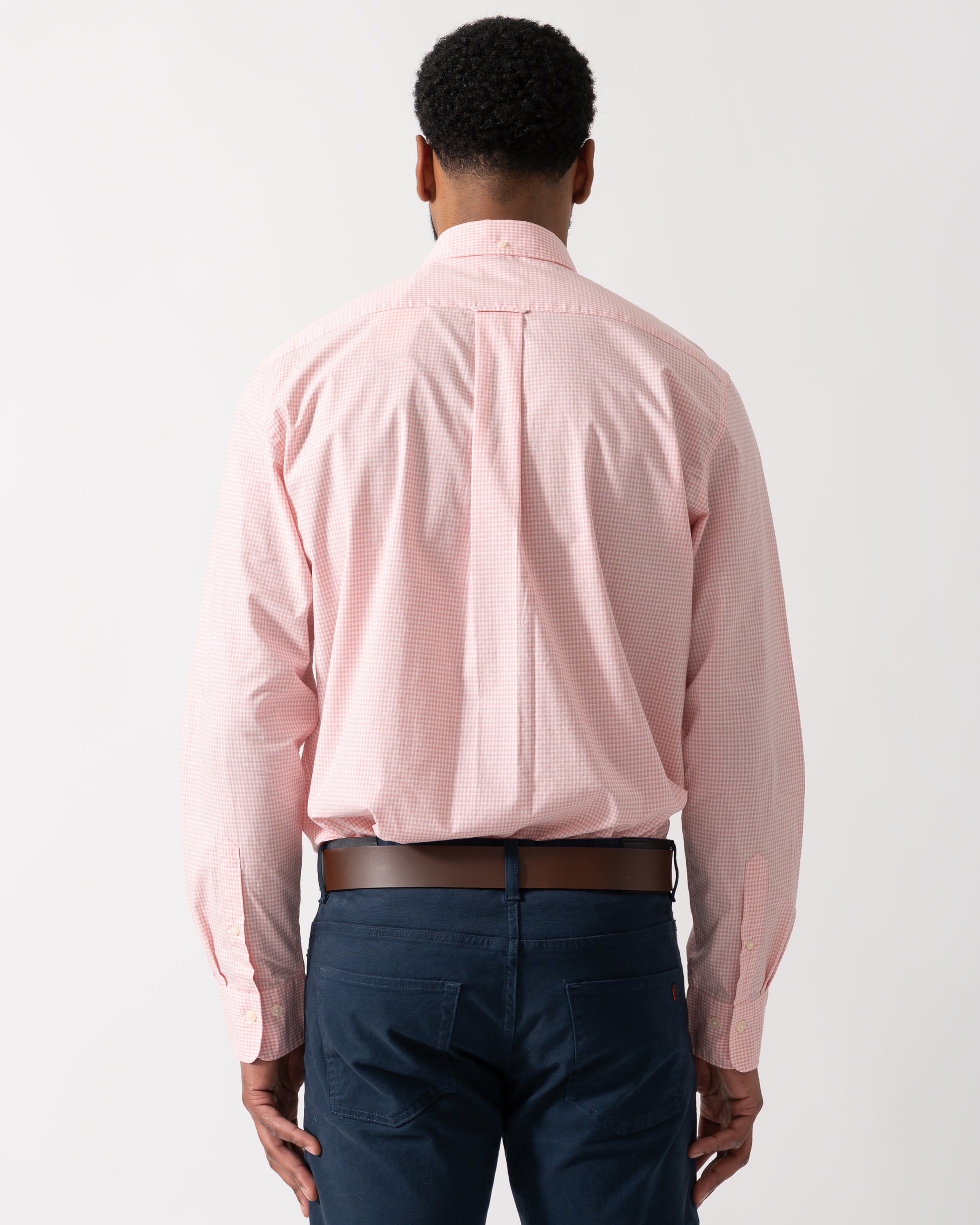 back shot of a Model wearing a GANT Mens Regular Fit Classic Poplin Gingham Shirt in Washed Pink