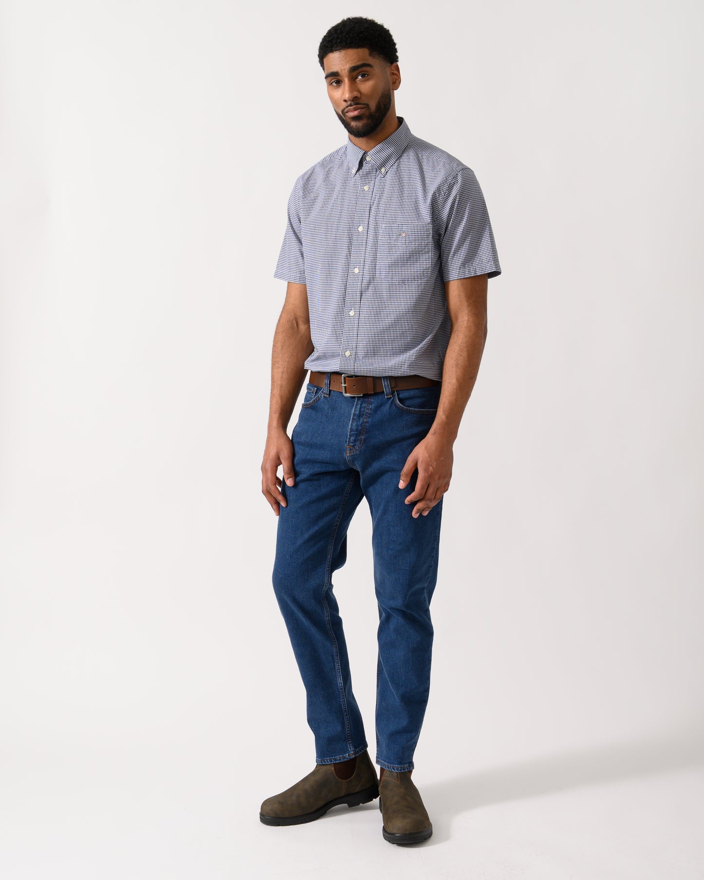 Full length shot of a Model wearing a GANT Mens Regular Fit Classic Poplin Gingham Short Sleeve Shirt in Persian Blue
