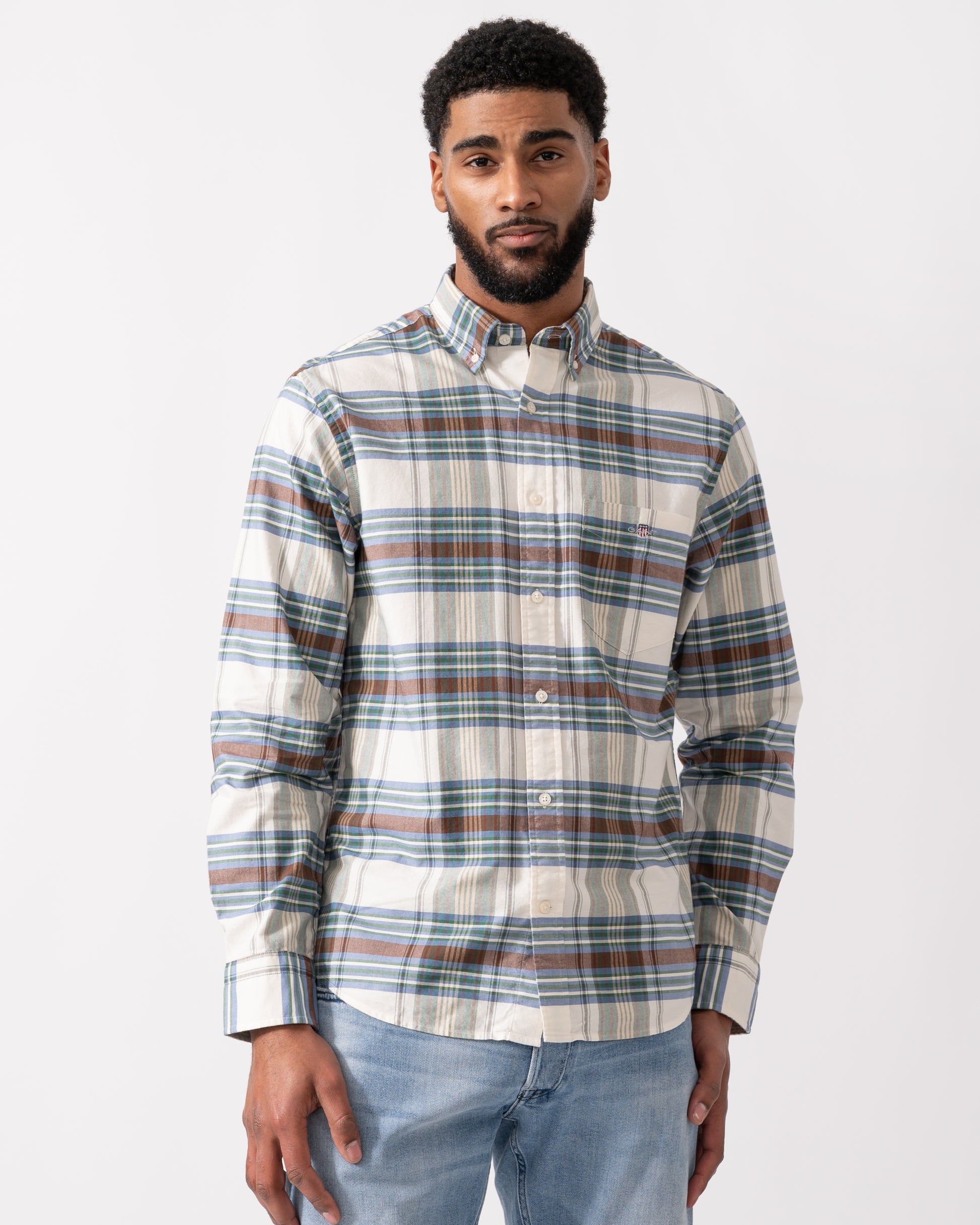 model wearing a GANT Mens Regular Fit Oxford Check Shirt in Woody Green