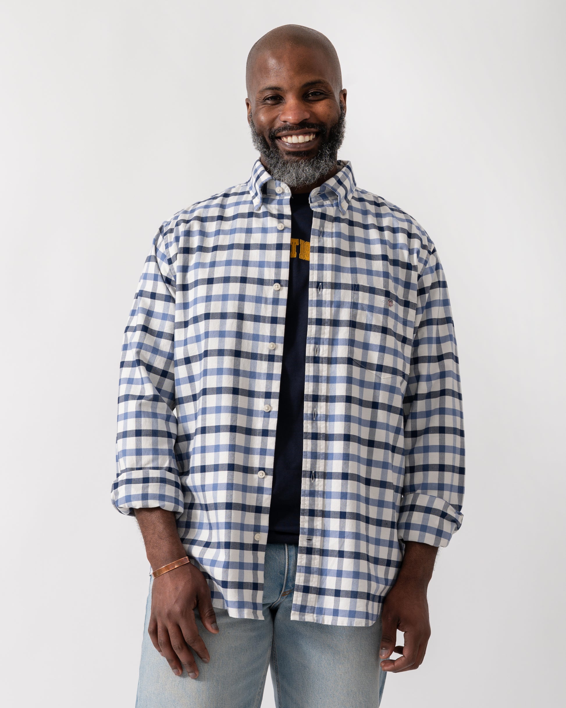 Model wearing a GANT Mens Regular Fit Oxford Check Shirt in Faded Denim