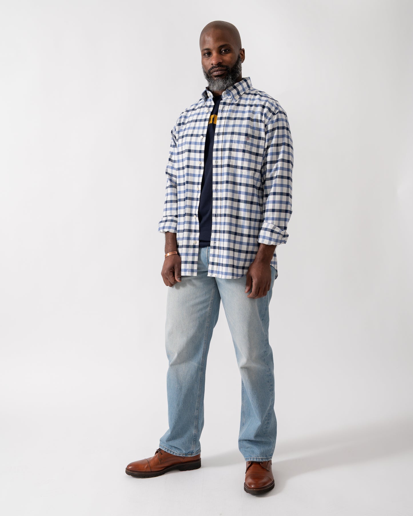 Full length shot of a Model wearing a GANT Mens Regular Fit Oxford Check Shirt in Faded Denim
