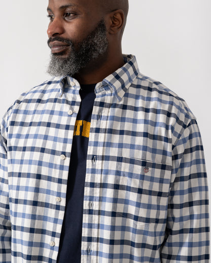 close up shot of a Model wearing a GANT Mens Regular Fit Oxford Check Shirt in Faded Denim