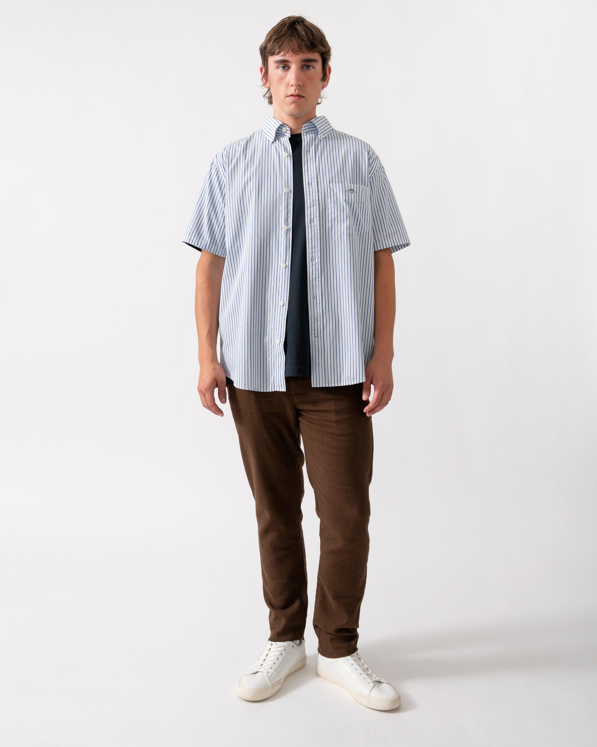full length of a GANT Mens Regular Fit Poplin Stripe Short Sleeve Shirt in 457 Fresh Blue