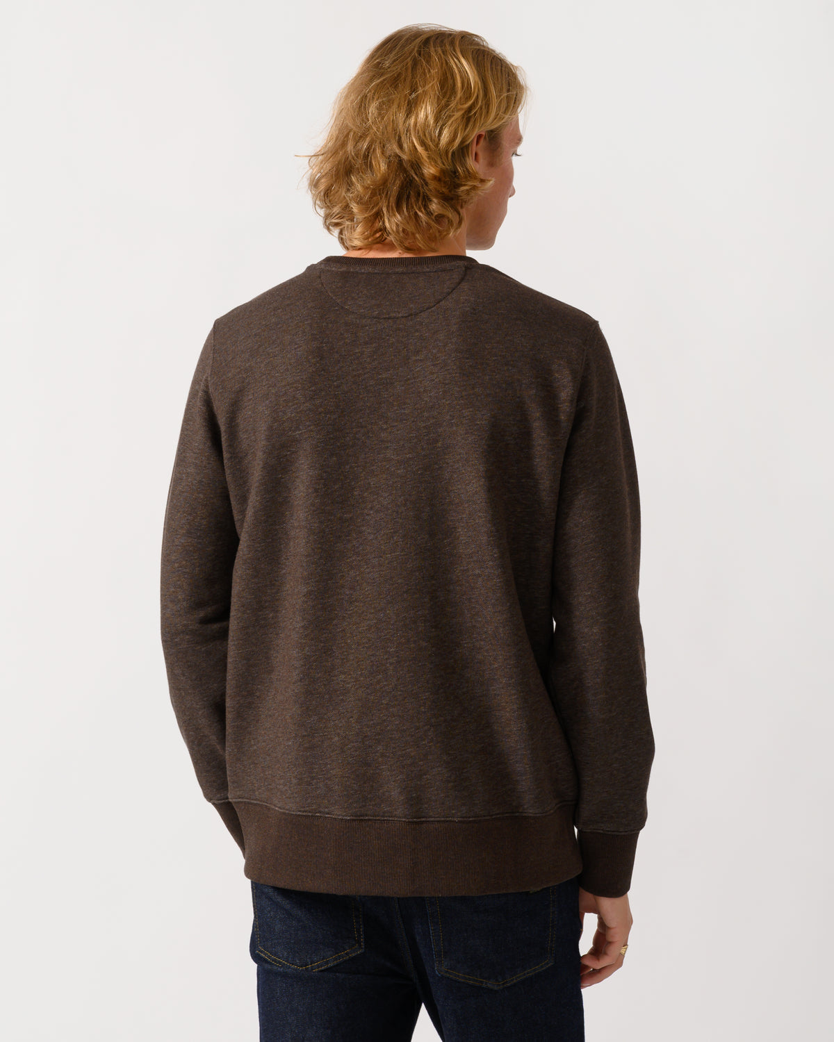 studio photograph showing the back of a model wearing a GANT Mens Regular Fit Shield Logo Crew Neck Sweatshirt in 284 Black Brown Melange