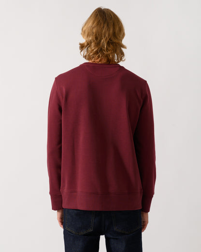 back of model wearing a GANT Mens Regular Fit Shield Logo Crew Neck Sweatshirt in 676 Deep Grape Wine