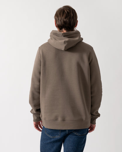back of model wearing a GANT Mens Regular Fit Shield Logo Pullover Hoodie in 260 Faded Taupe