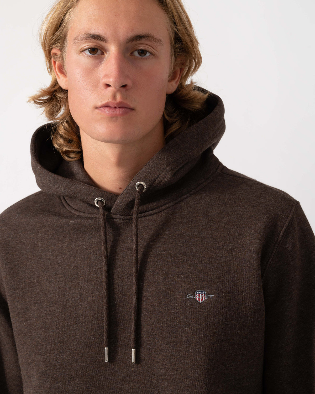 Detail of the GANT Mens Regular Fit Shield Logo Pullover Hoodie - 284 Black Brown Melange