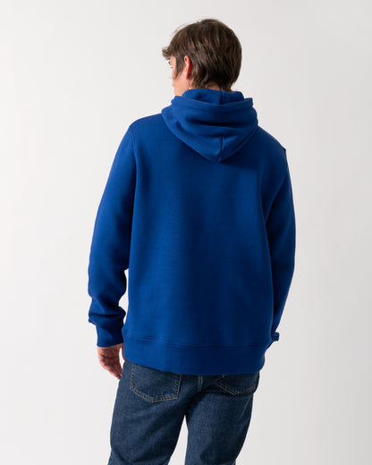 back shot of a model wearing a GANT Mens Regular Fit Shield Logo Pullover Hoodie in 435 Crisp Blue