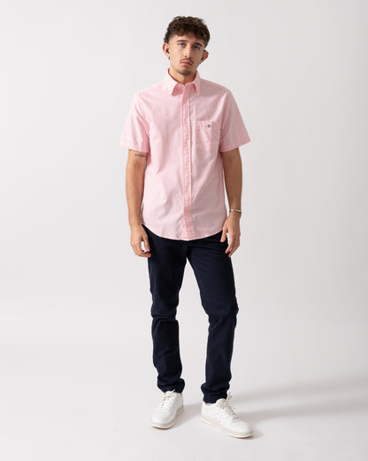 Full length shot of a Model wearing a GANT Mens Regular Fit Short Sleeve Oxford Shirt in Washed Pink