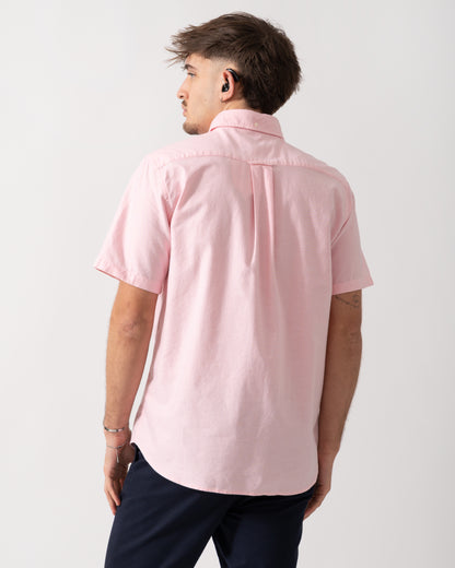 back shot of a Model wearing a GANT Mens Regular Fit Short Sleeve Oxford Shirt in Washed Pink