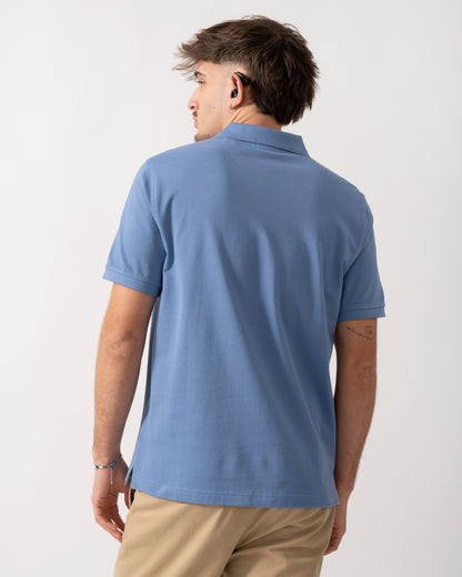 Back shot of a Model wearing a GANT Mens Regular Fit Short Sleeve Shield Logo Pique Polo in Faded Denim
