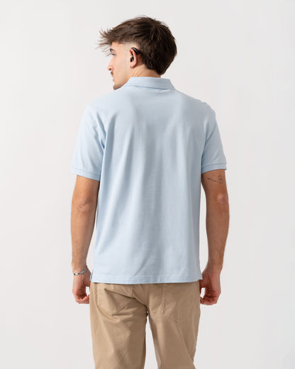 back shot of a model wearing a GANT Mens Regular Fit Short Sleeve Shield Logo Pique Polo in Fresh Blue