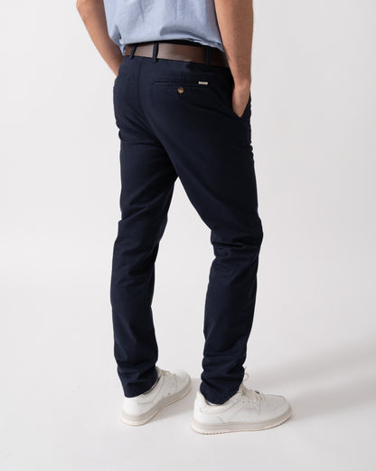back shot of a Model wearing GANT Mens Slim Fit Classic Chinos in Evening Blue